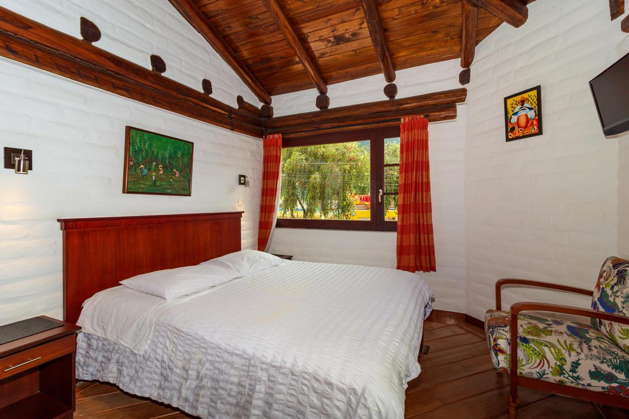 Hostal ILÉ Baños Habitación foto